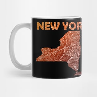 Colorful mandala art map of New York with text in brown and orange Mug